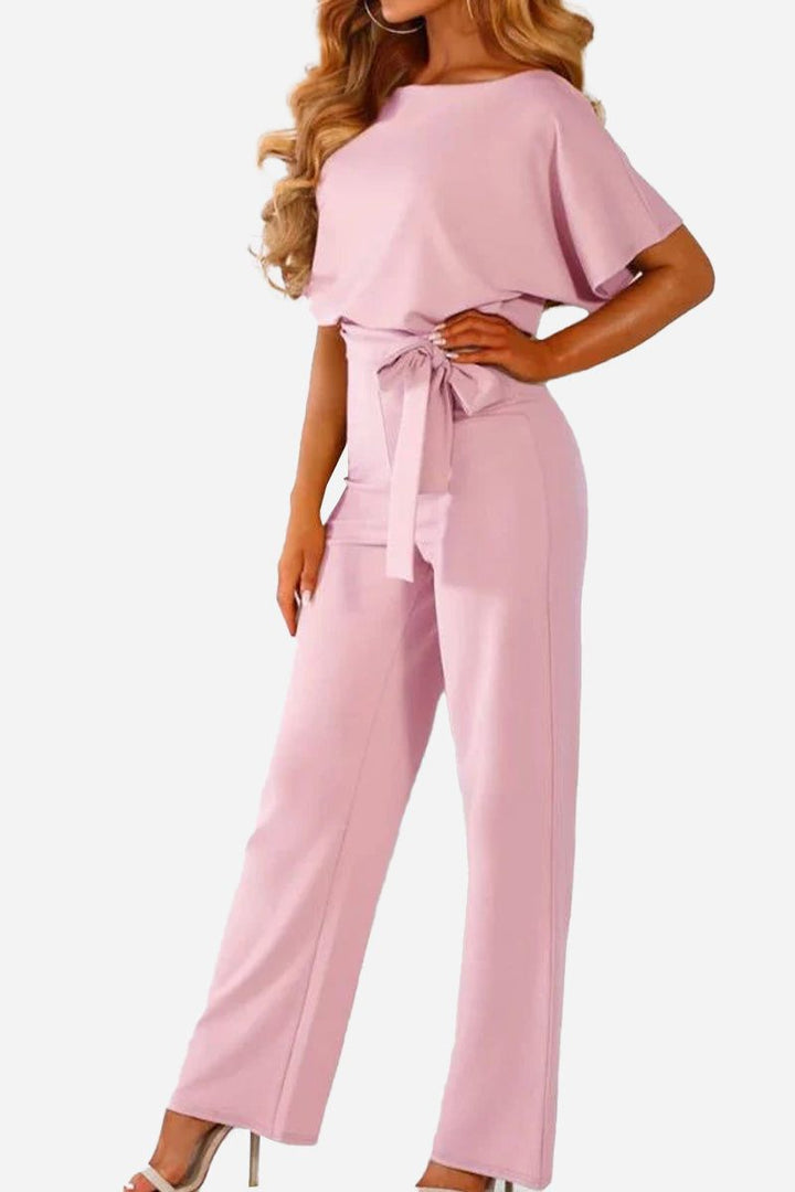 Versatile women's wide-leg jumpsuit, comfortable one-piece with elegant batwing sleeves & flattering belted design.