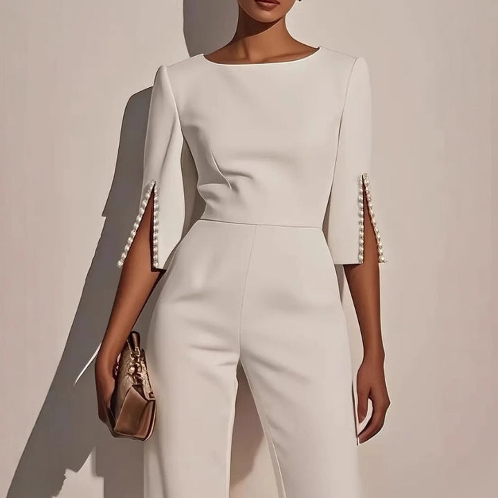 Elegant women's wide leg jumpsuit with pearl sleeves, ideal for special occasions or stylish casual wear.