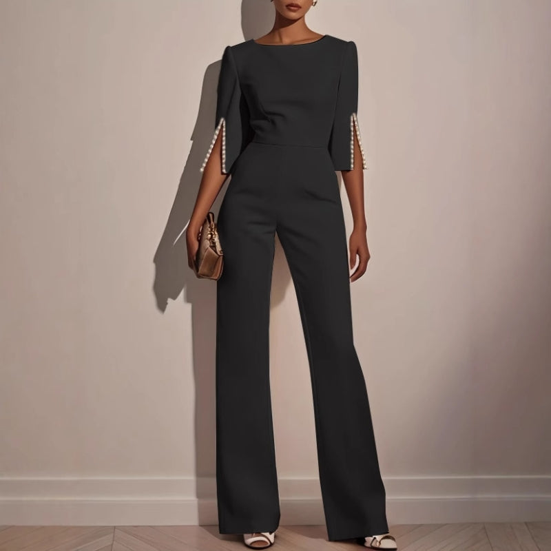 Chic and comfortable women's wide leg jumpsuit with unique pearl detail sleeves for relaxed fit fashion.