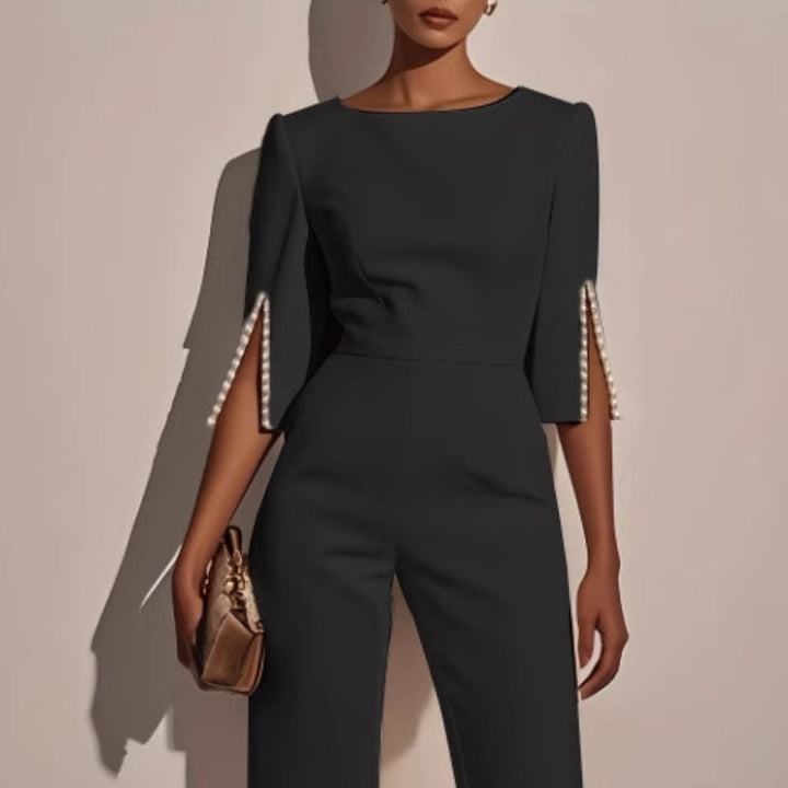 Stylish wide leg jumpsuit for women, featuring pearl sleeves. A comfortable & chic spring/summer outfit.