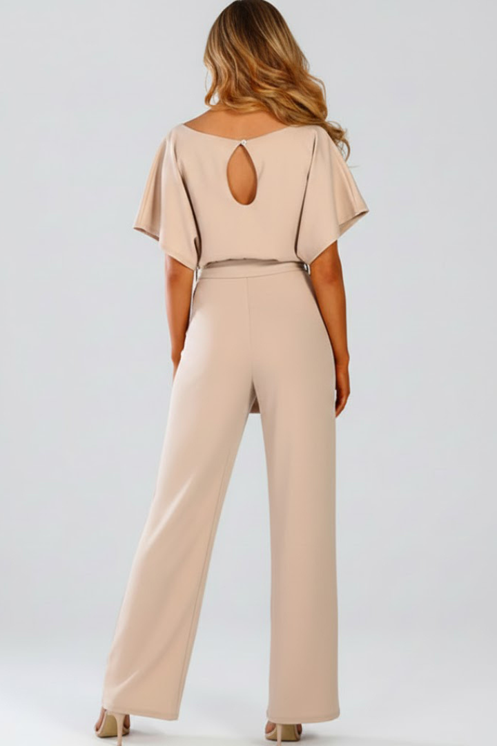 Comfortable women's wide leg short sleeve jumpsuit with a belt. Versatile for casual or elegant outfits.