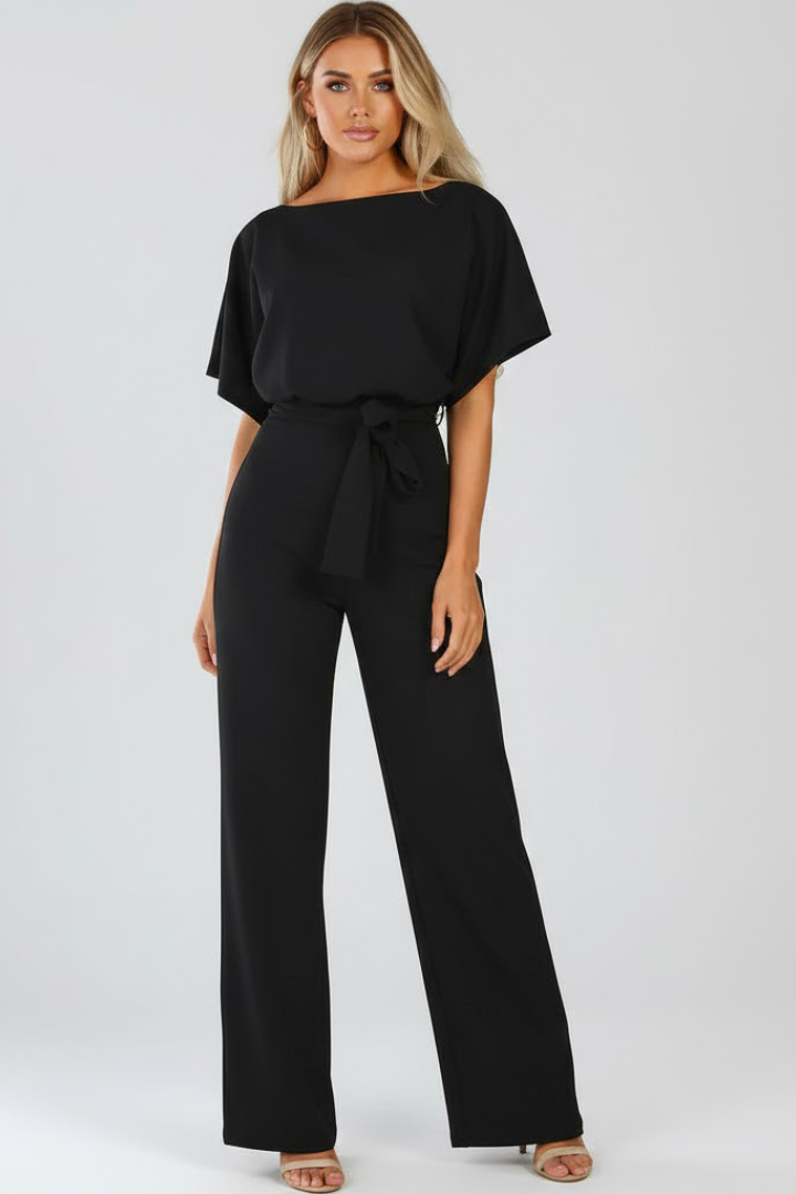 Women's belted jumpsuit. Wide leg, short sleeve style for a comfortable, elegant, and versatile summer look.