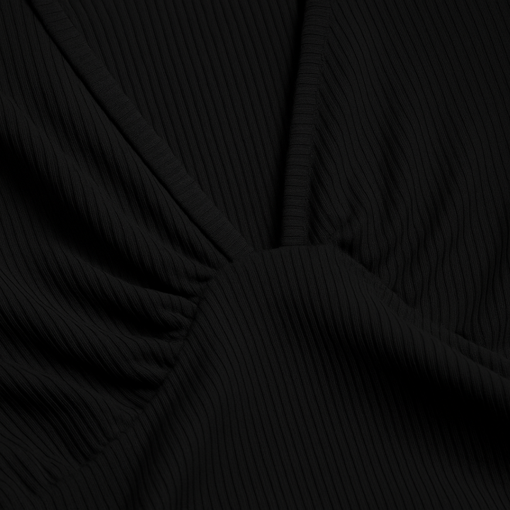 Women's solid color wide-leg jumpsuit, sleeveless and relaxed fit for modern, comfortable fashion.