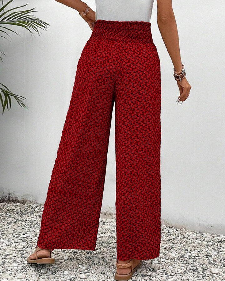 Fashion-forward women's wide leg trousers. Features a chic geometric print and a relaxed, comfortable fit.