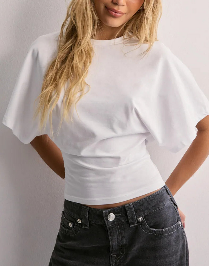 Chic women's wide sleeve top. Elegant, modern fit fashion tee for office wear or versatile summer style.
