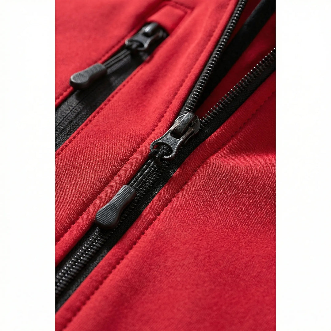 Women's hooded softshell jacket featuring zippered pockets, perfect for outdoor activities & activewear.