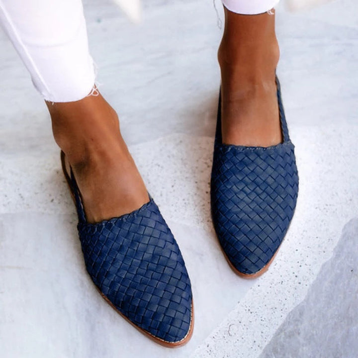 Chic women's backless flats, woven closed toe mules for comfortable, stylish everyday wear.