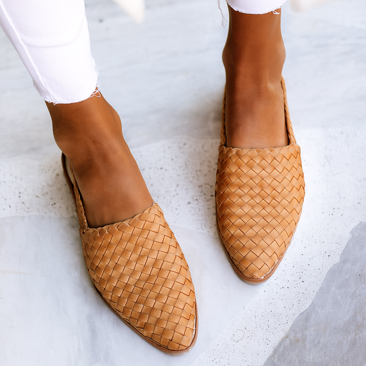 Light brown woven women's mules, closed toe slip-on flats perfect for versatile wear.