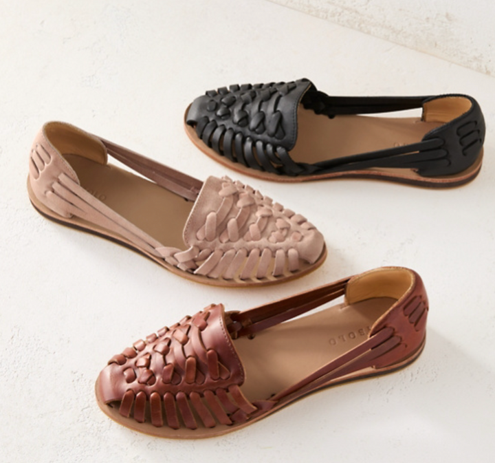 Women's woven flat buckle sandals, perfect for casual everyday wear. Comfortable summer footwear.