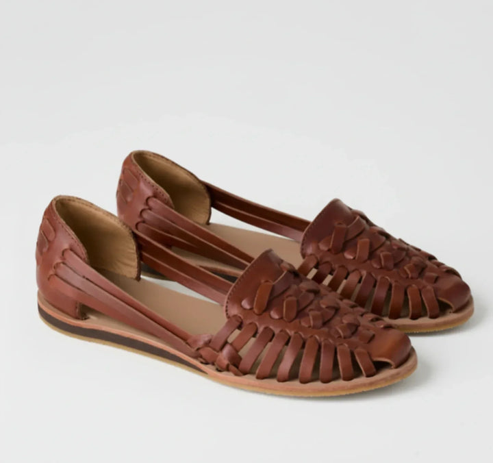 Comfortable women's slip-on mules with a stylish woven design, perfect for easy wear & daily foot support.