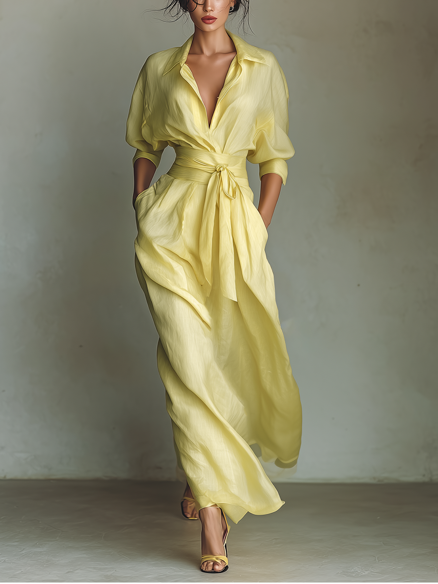 Women's yellow elegant maxi shirt dress with billowy sleeves & tie waist.