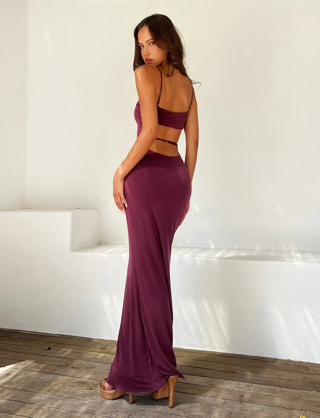 Elegant backless bandeau cocktail dress for women, floor-length and sleeveless for parties.