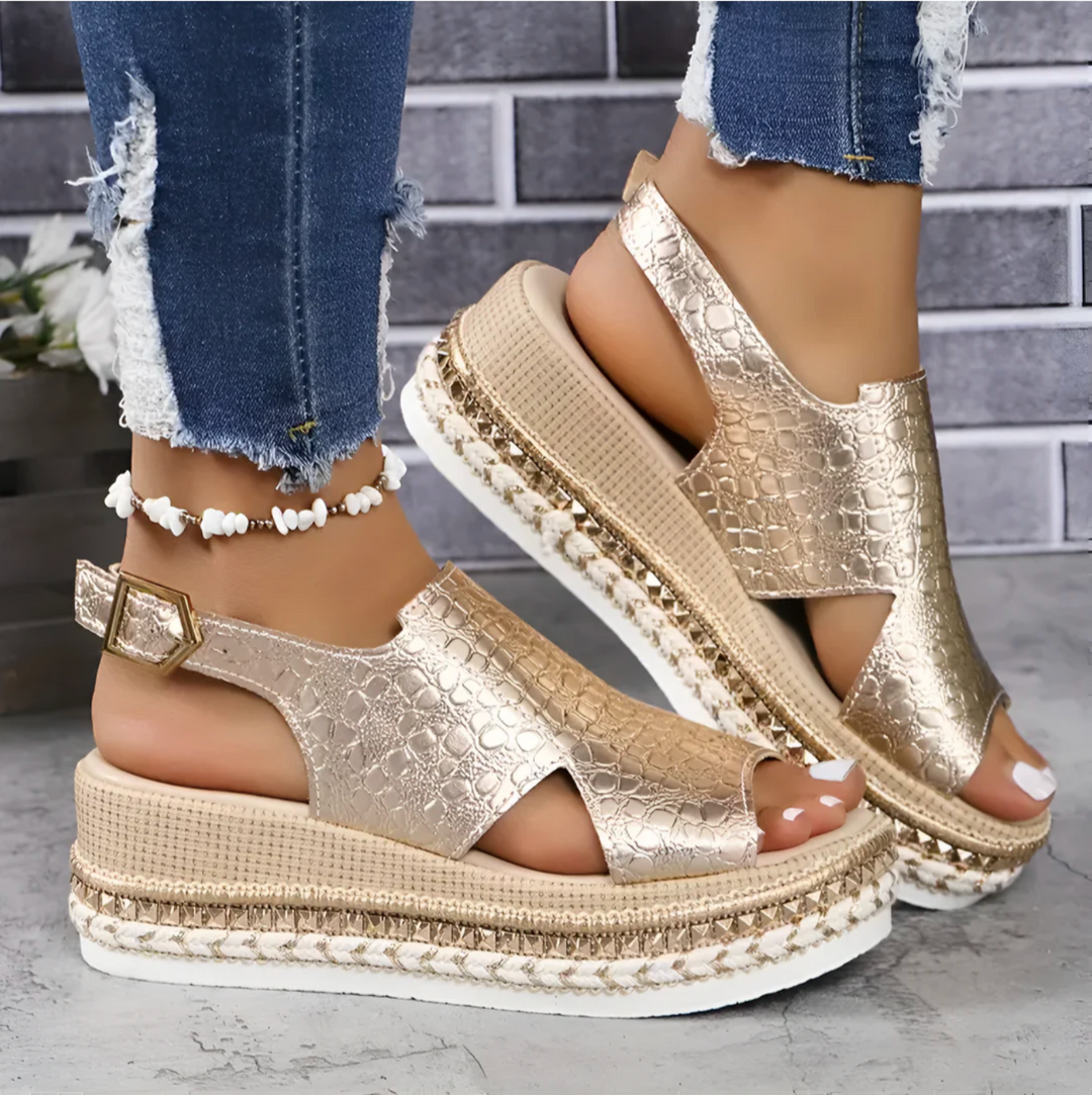 Stylish silver Zinnia wedge sandals, perfect for women seeking comfortable, lightweight summer footwear.