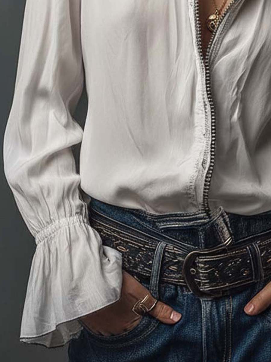 Elegant women's blouse: zip-front design, long sleeves, and sophisticated bell cuffs for a polished look.
