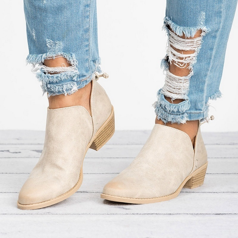Women's black back zip ankle boots with low block heel. Versatile casual everyday fashion footwear for comfort.