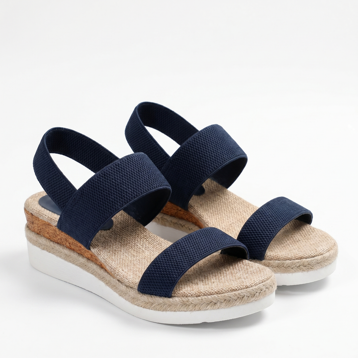 Supportive orthopedic sandals for women, featuring a comfortable wedge heel & elastic straps.