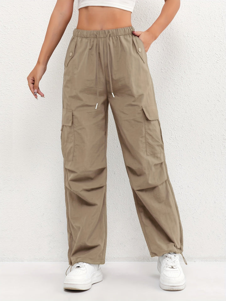 Versatile women's loose fit cargo parachute pants for casual wear or streetwear, with a comfy drawstring waist.