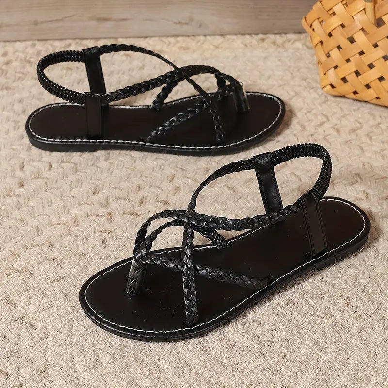Casual open-toe flat sandals for women with elastic straps, comfortable and perfect for summer days.