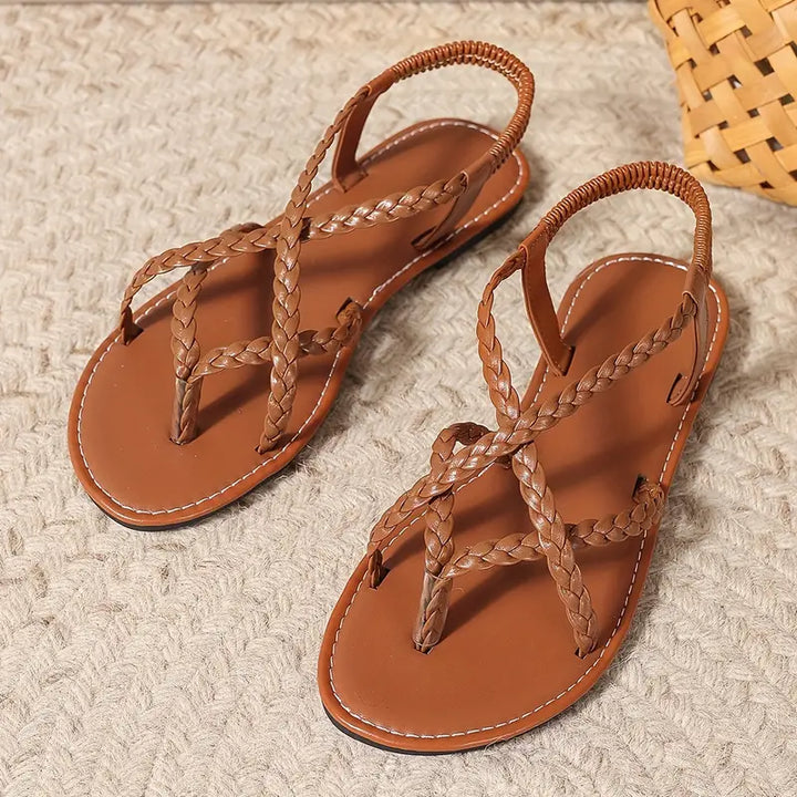 Versatile women's slip-on flat sandals with open toe and elastic straps, comfortable everyday style.