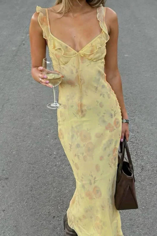 Elegant women's floral spaghetti strap slip maxi dress, perfect for summer. Flowy and comfortable.