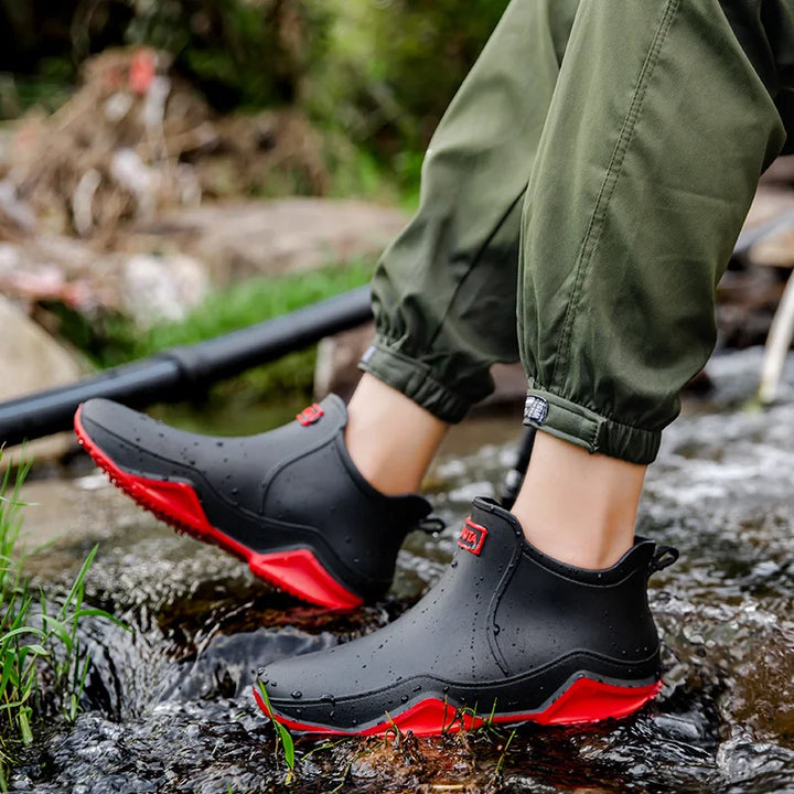 White women's waterproof slip-on ankle rain boots, ideal for comfort and rainy days.