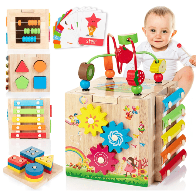 Sensory play activity cube for toddlers with a shape sorter, bead maze, and clock to aid early learning.