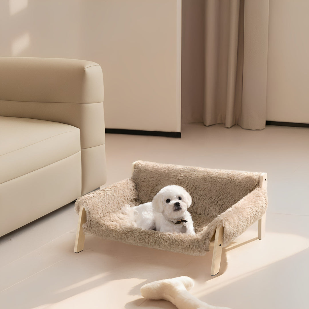 Close-up of the wooden frame of an elevated dog bed, showcasing quality craftsmanship and design.