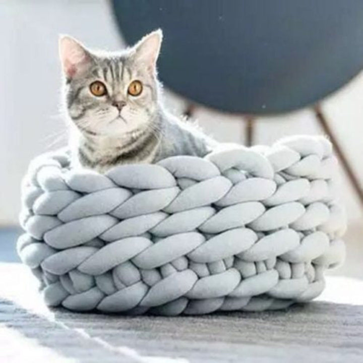 Textured close-up of a breathable cotton rope pet bed, ideal for small pets' comfort.