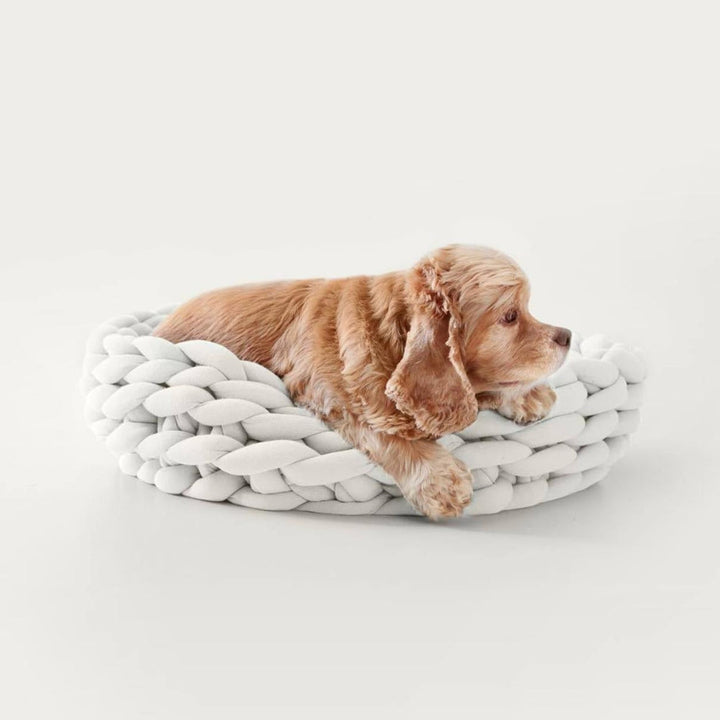 A stylish small pet bed made from natural woven cotton rope, comfortable and hand washable.