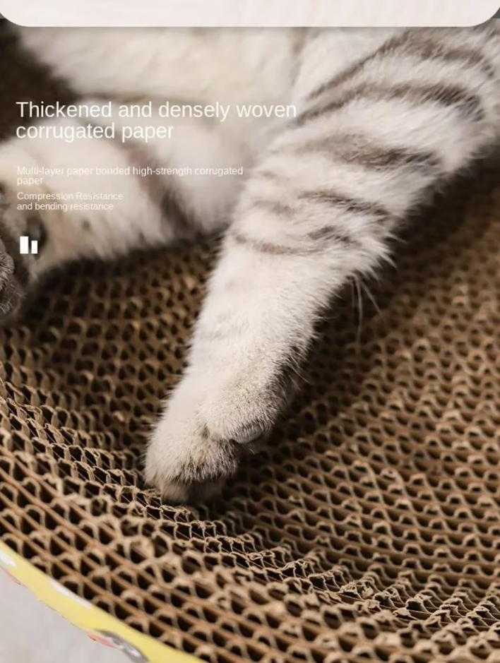 Close-up of the textured yellow cat scratching lounge, designed for effective claw care