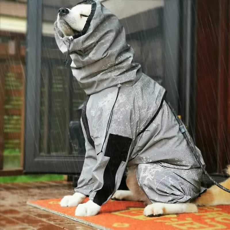 Yellow dog raincoat with adjustable hood and reflective strips for full coverage, outdoor gear.