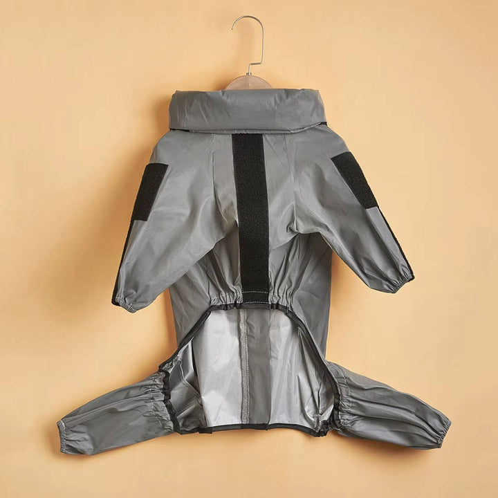 Outdoor gear for dogs: a durable, bright yellow raincoat with hood and reflective safety features.