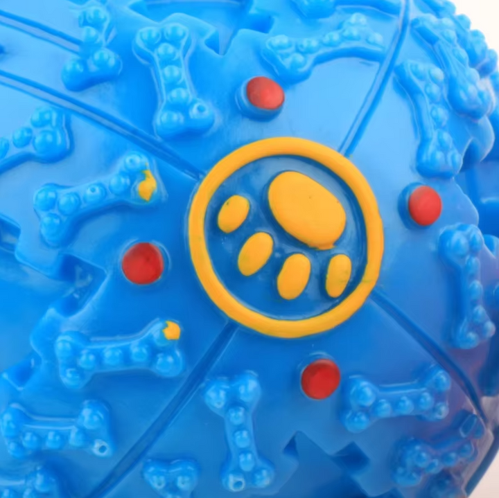 Durable pet play dog toy, an interactive squeaky treat dispenser ball for boredombusting.