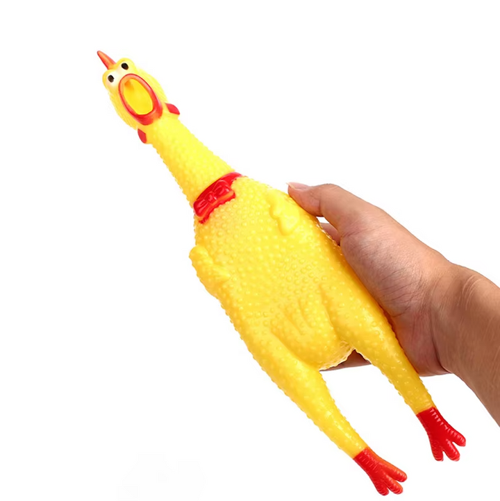 Bright yellow squeaky rubber chicken dog toy, perfect for pet enrichment