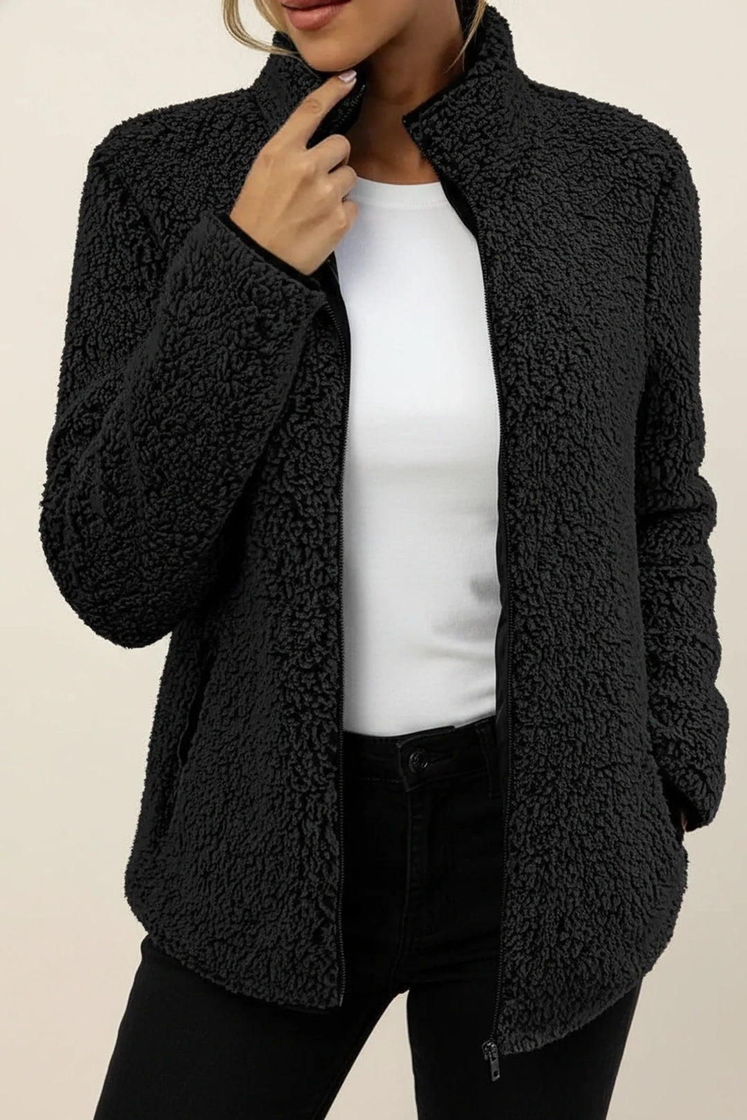 Woman wearing a cozy warm winter jacket, perfect for comfort, casual outings, and cold weather.